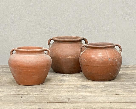 Weathered antique terracotta pot
