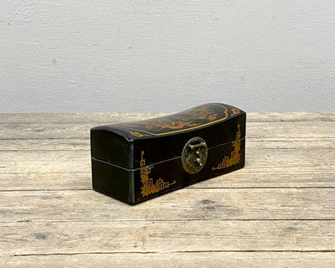 Small black lacquered boxes